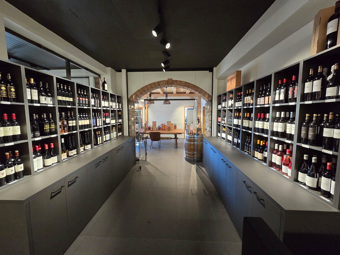 Cellar shelves beneath the arch
